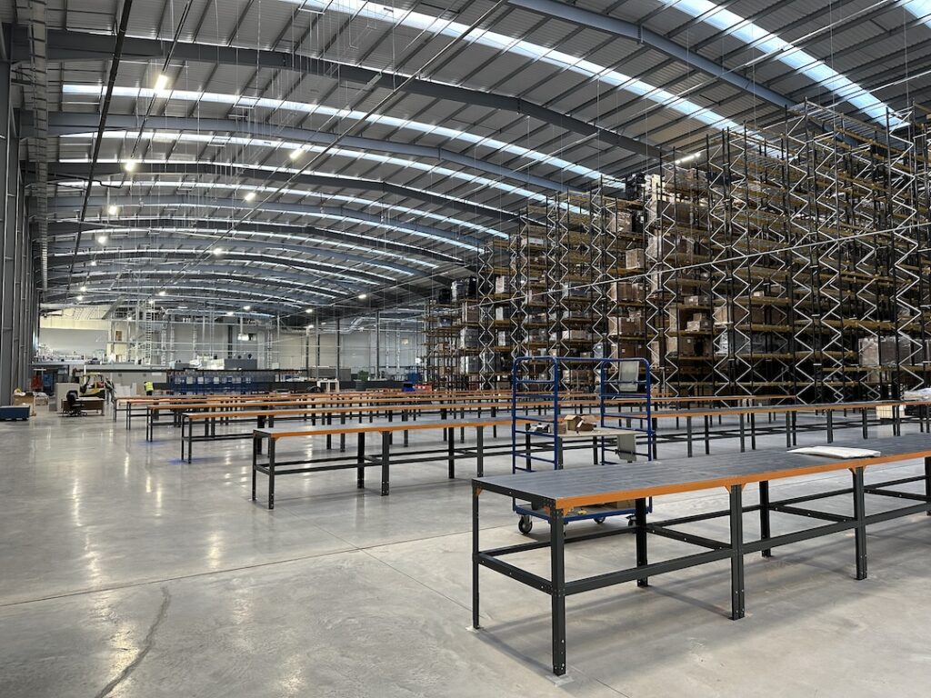 Large warehouse with industrial racking in the background