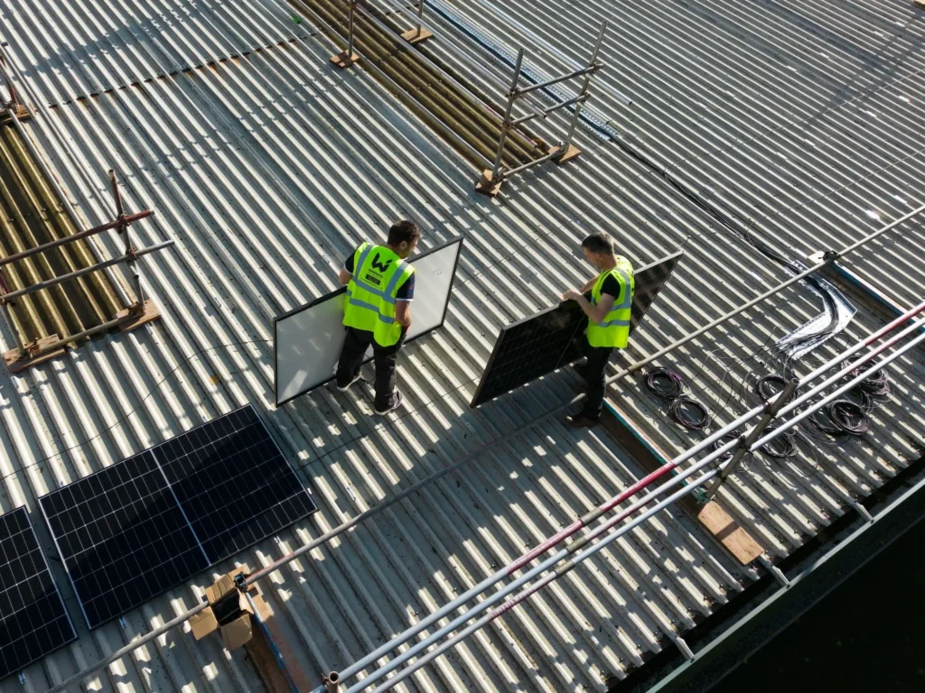 M&E contrax team installing new solar panels