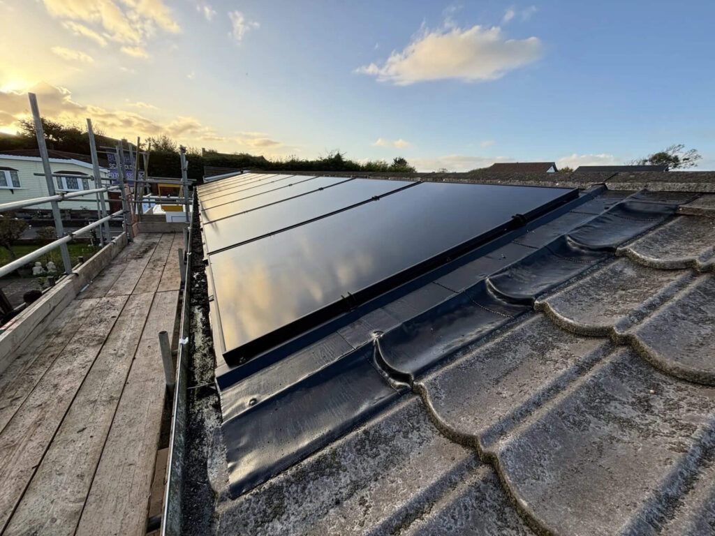 Row of solar panels installed on roof