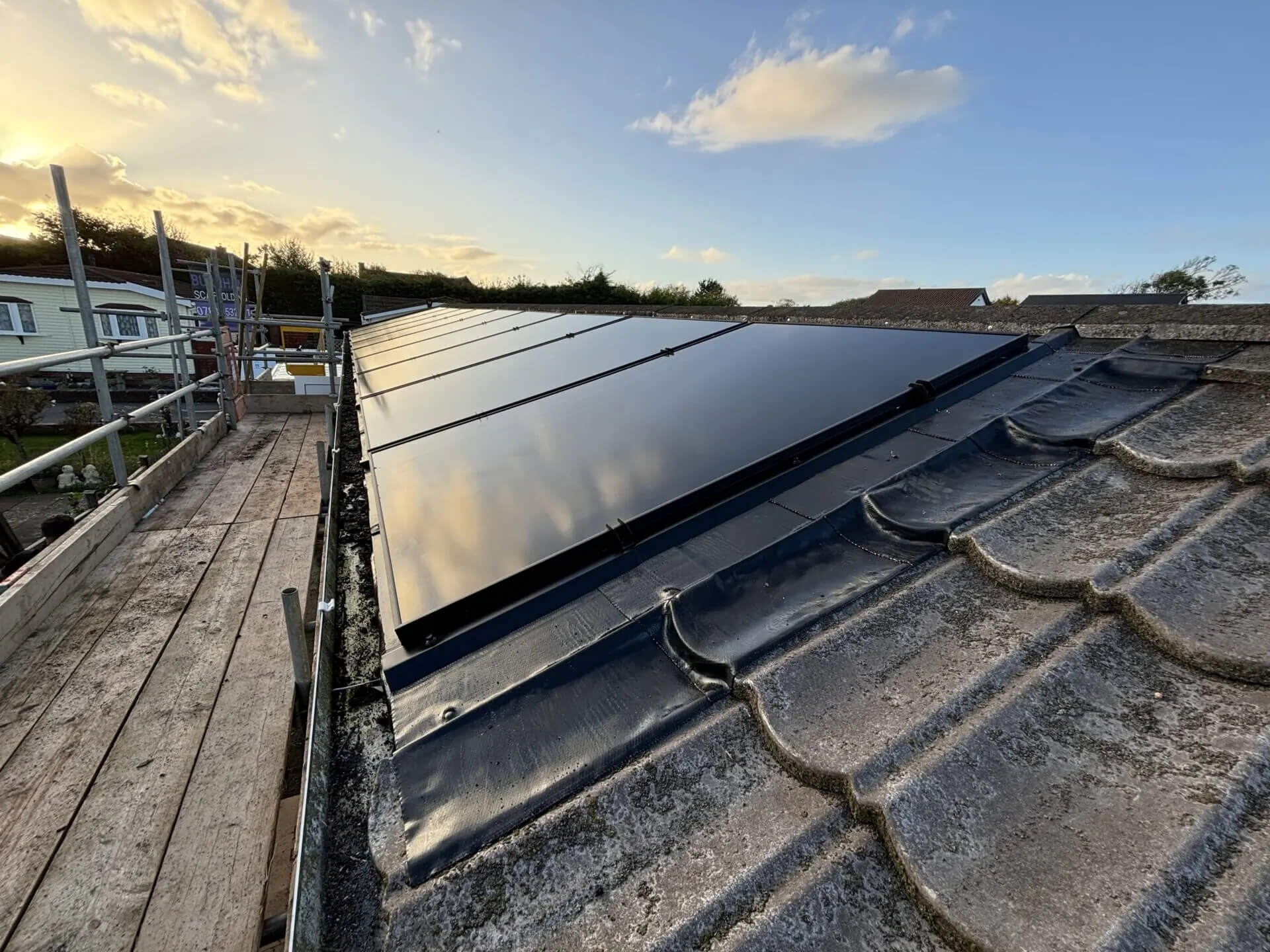 Row of solar panels installed on roof