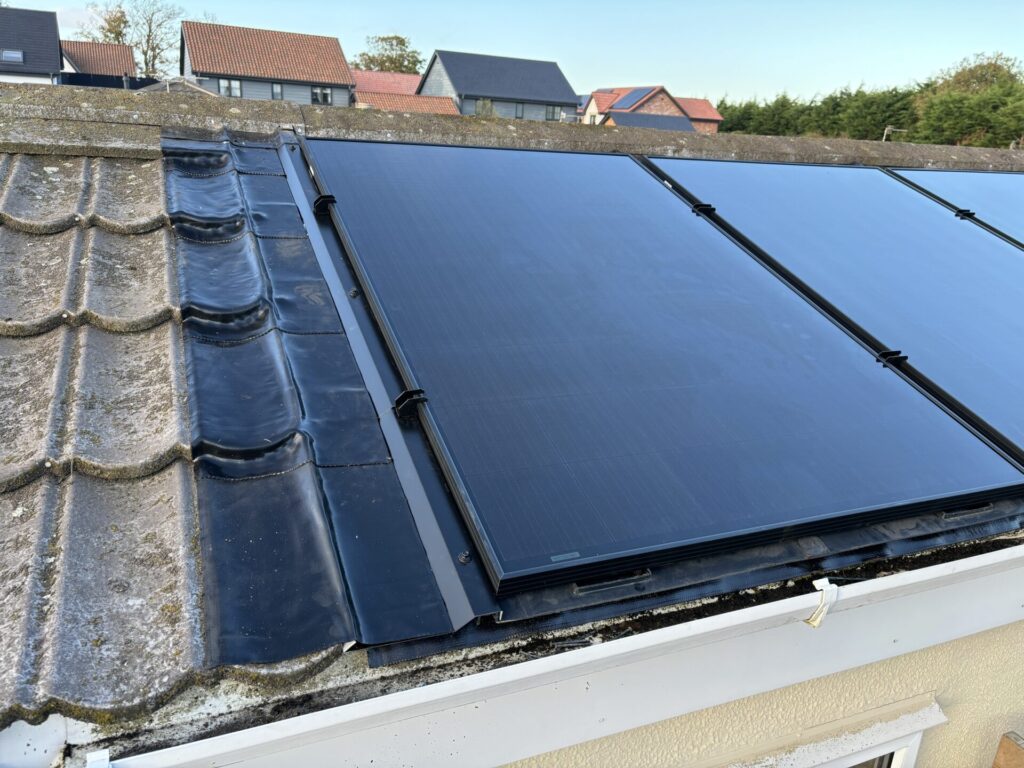 flat solar panelson domestic roof installation