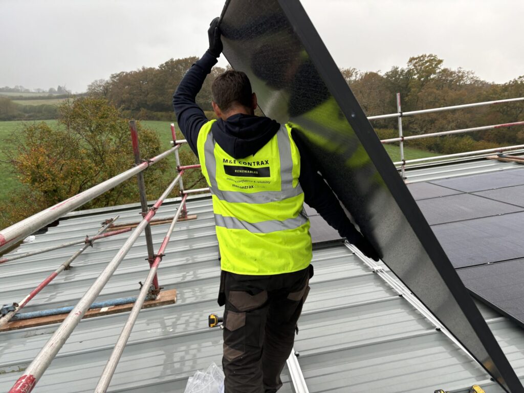 carrying a solar panel