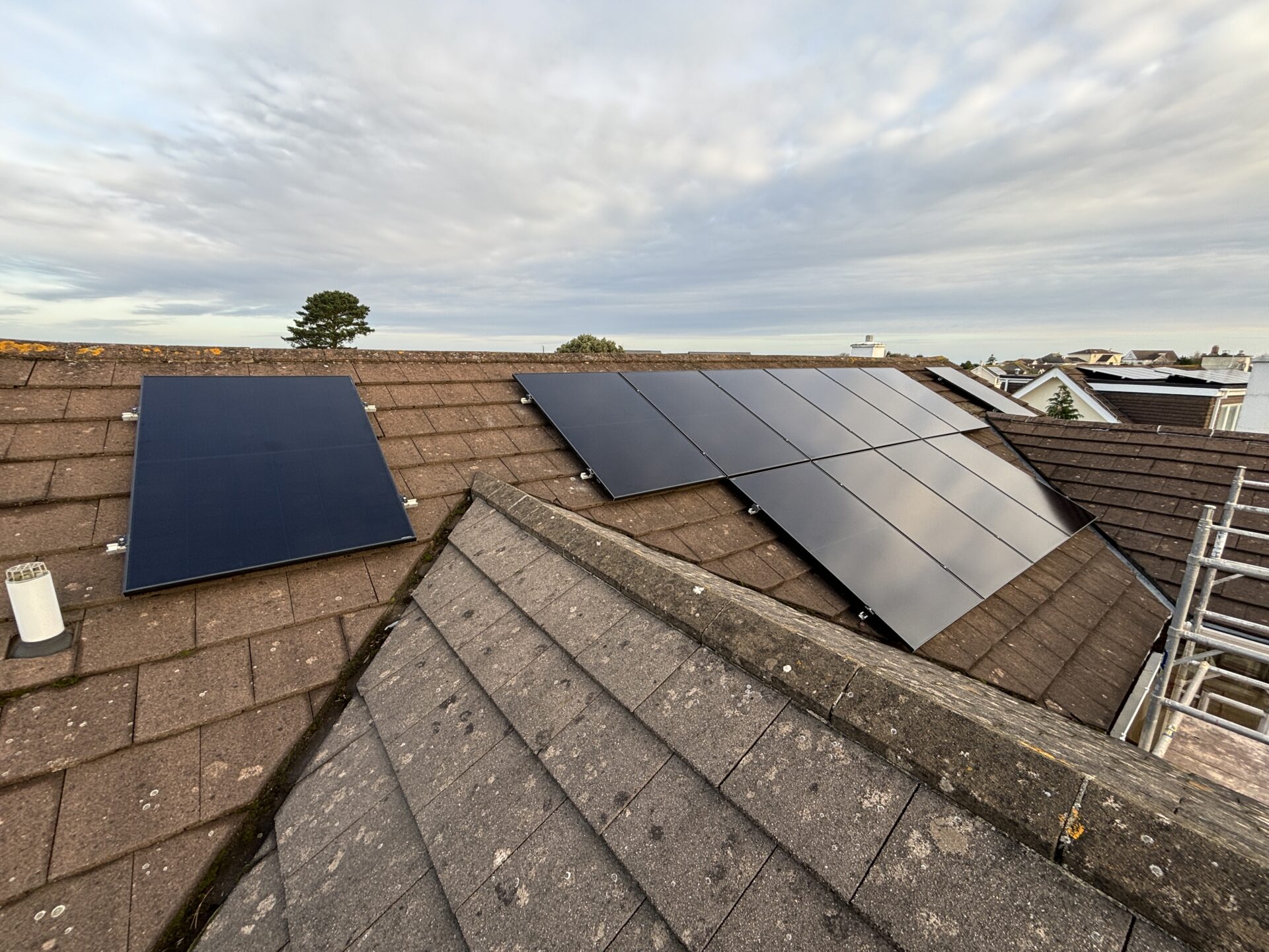 solar panels on roof with single panel on side
