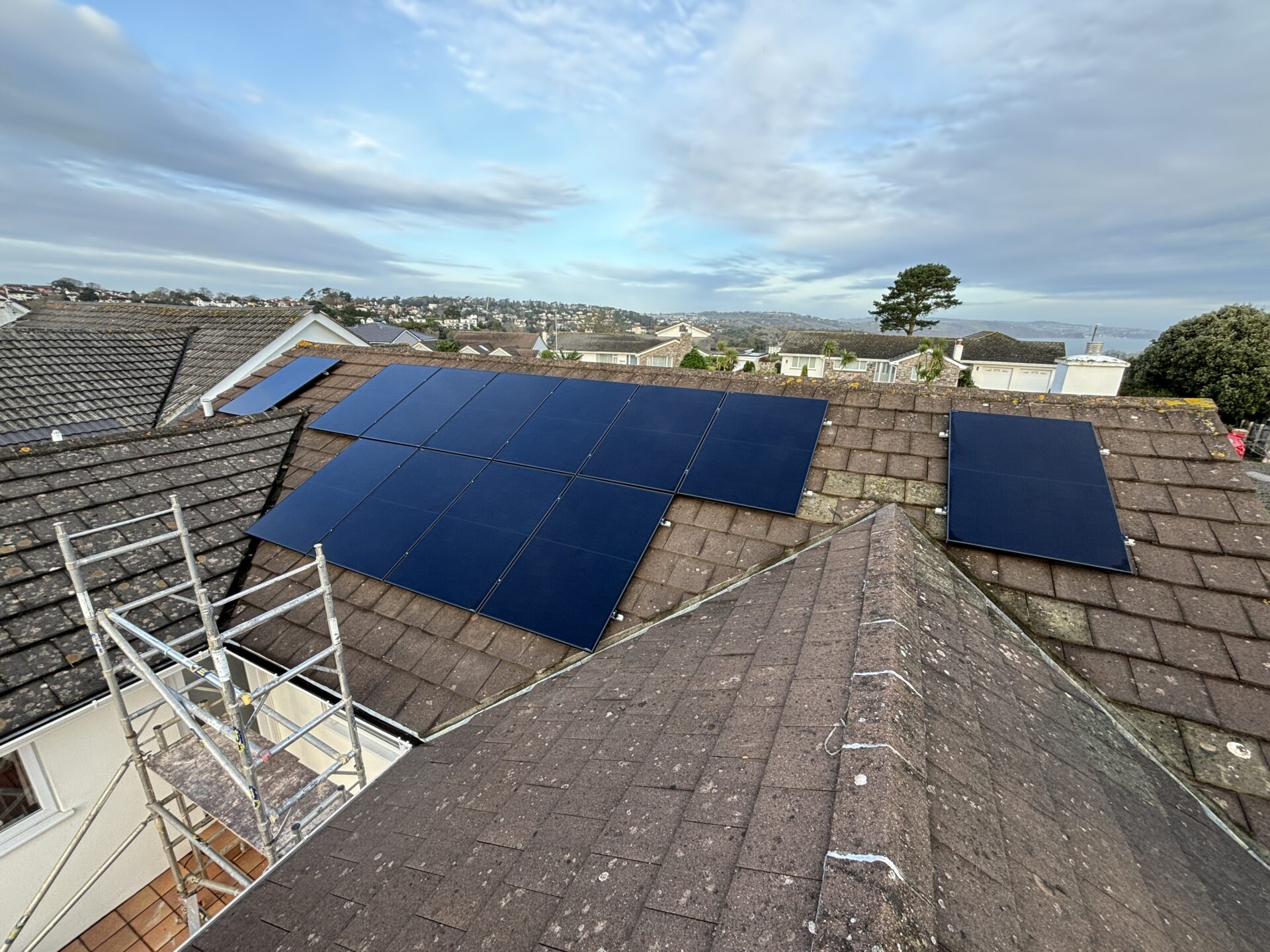Direct shot of solar panels spanning roof