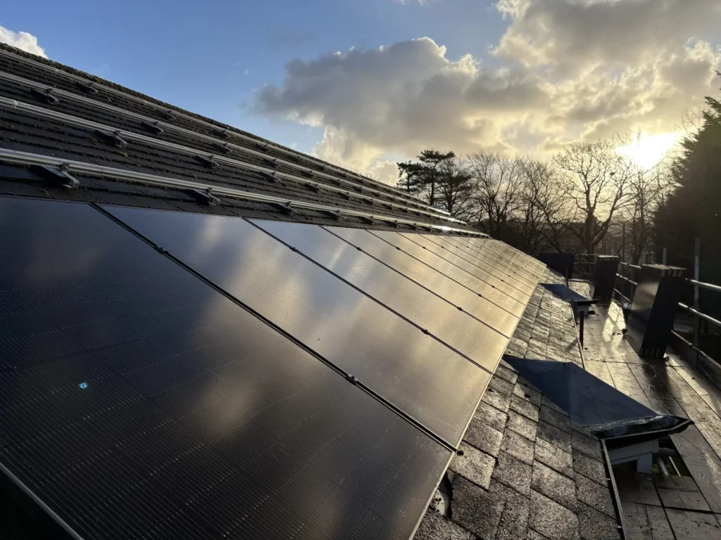 single row of solar panels mid way through installation