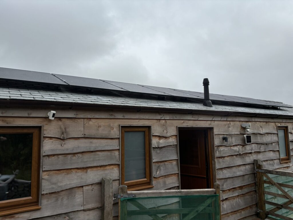 low shot of solar panels on roof