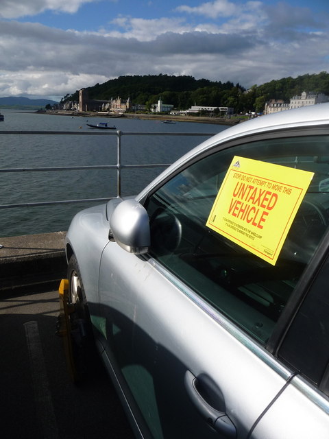 untaxed vehicle with notice on window