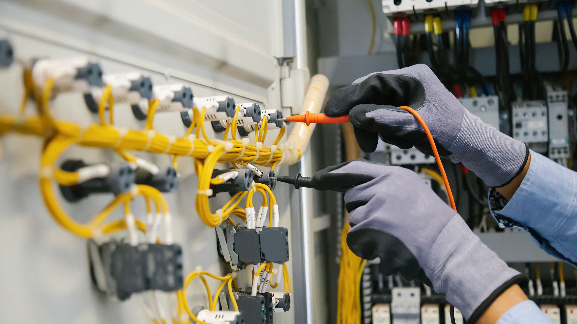 NICEIC-approved electrician carrying out EICR testing at commercial premises in Newton Abbot