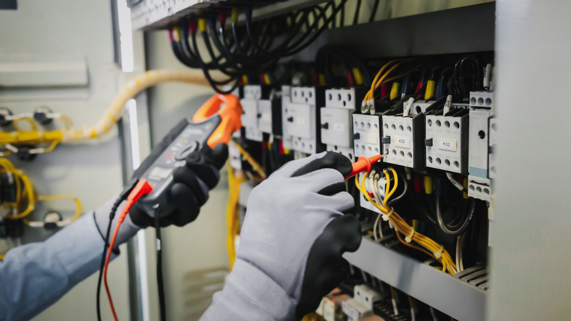 NICEIC-approved electrician carrying out EICR testing at commercial premises in Newton Abbot
