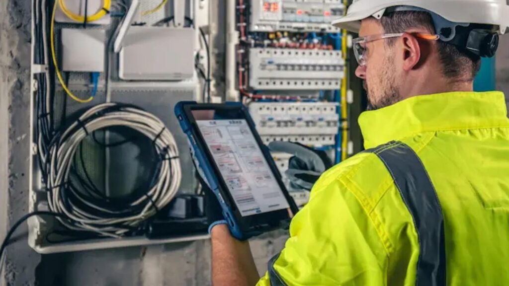 electrician conducting eicr inspection